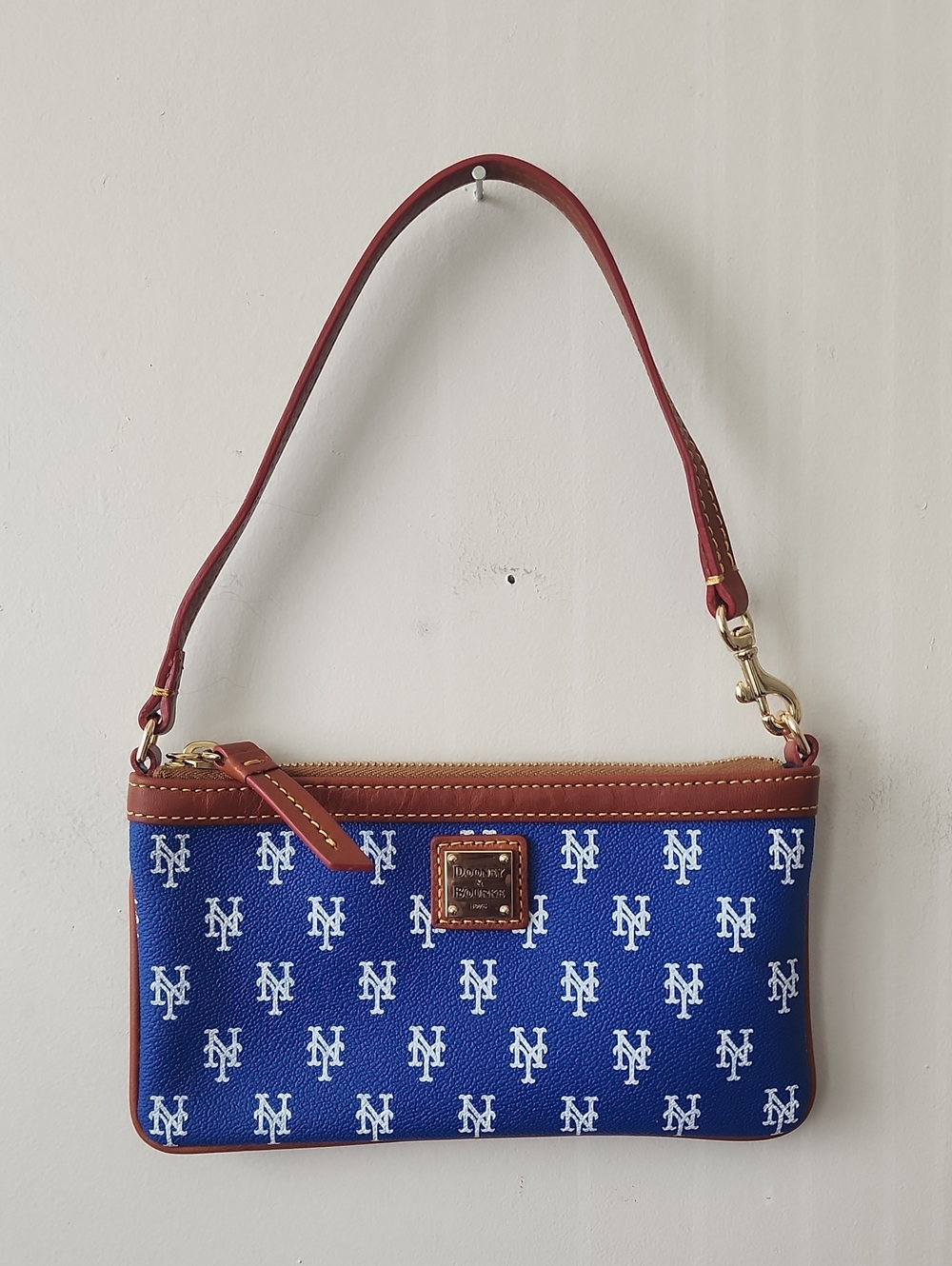 Dooney & Bourke Blue New York Monogram Wristlet with Brown Trim. New Without Tag